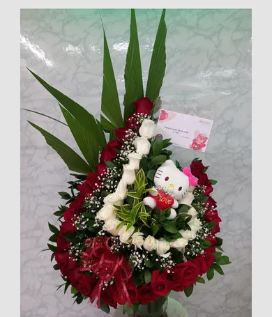 074-Media luna roja y blanca con peluche